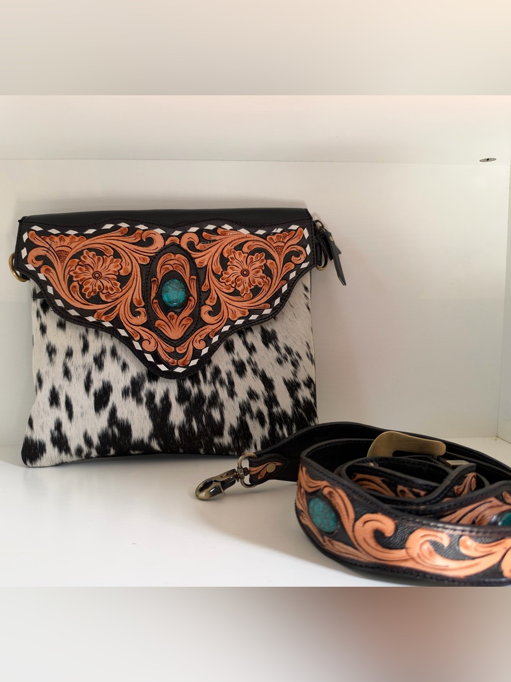turquoise accent hair-on cowhide crossbody bag - black & white handpainted